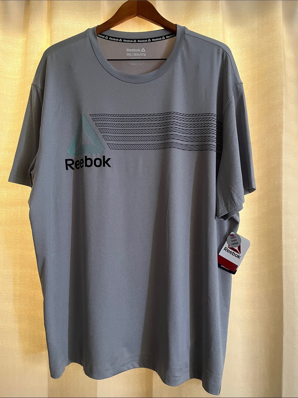 Reebok Men’s Light Gray Graphic Short Sleeve Tee